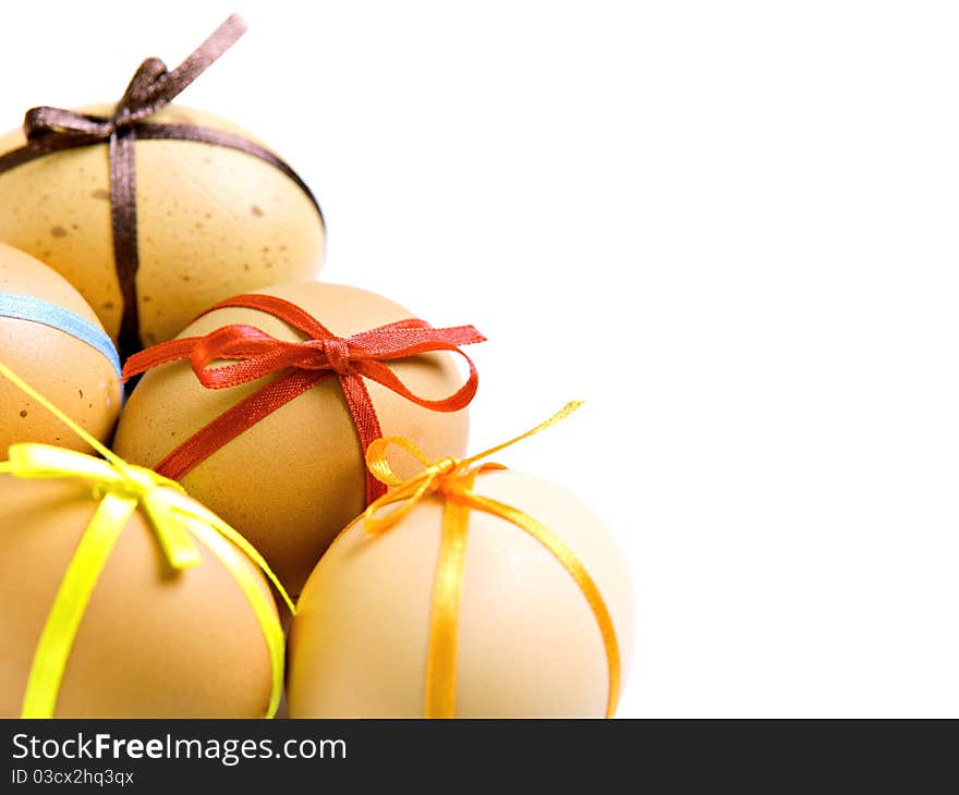 Easter eggs with different ribbons and bows, isolated on white. Easter eggs with different ribbons and bows, isolated on white