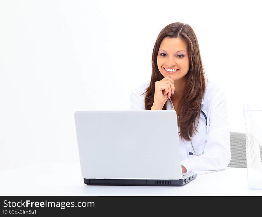 Businesswoman working at desk, isolated on white. Businesswoman working at desk, isolated on white.