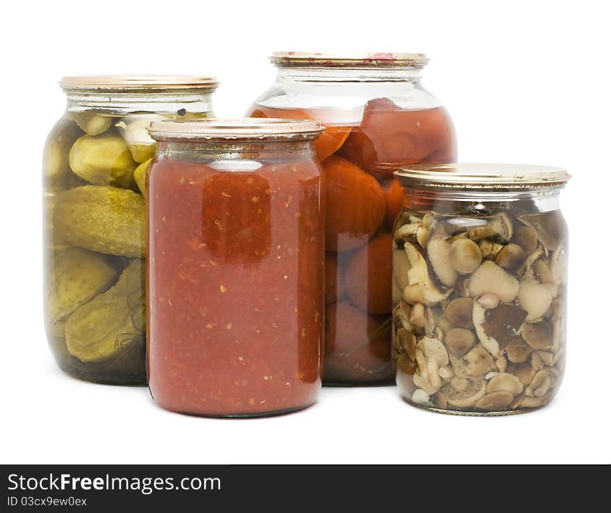 Picture of preservations in jars on a white background