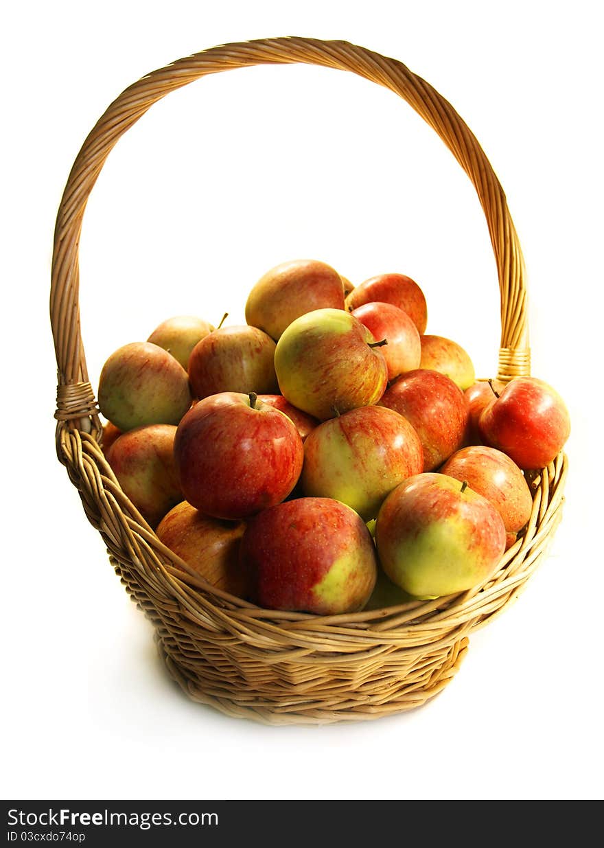 Red ripe apples in a basket