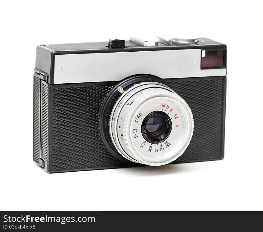 Old camera with the lens isolated on a white background