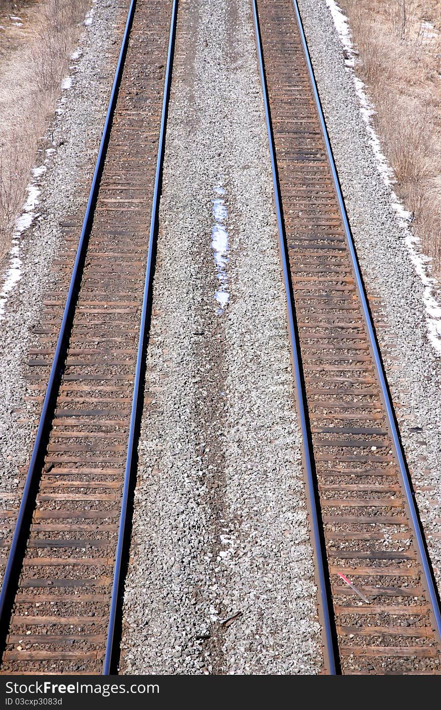 Rail tracks running towards an unknown destination