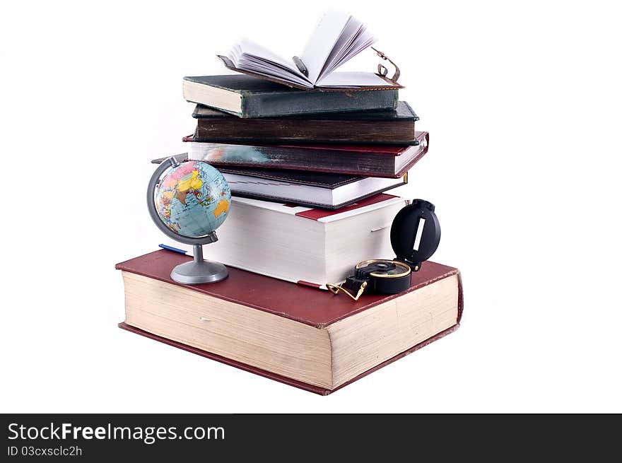 Books and the globe on isolated on a white background. Books and the globe on isolated on a white background