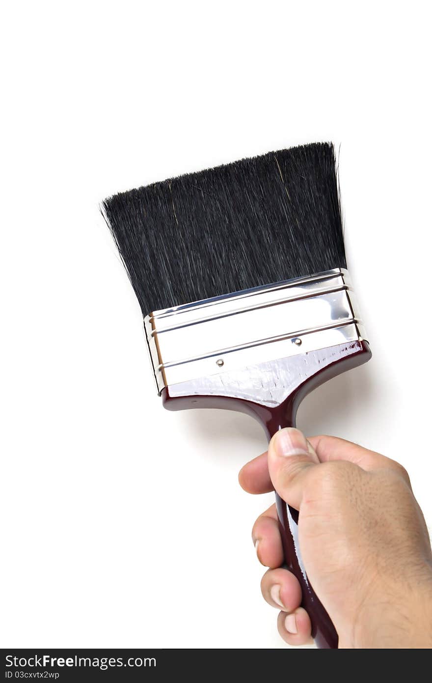 Wooden paintbrush.