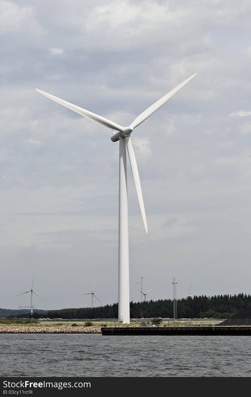 Wind generator on a river coast, Denmark