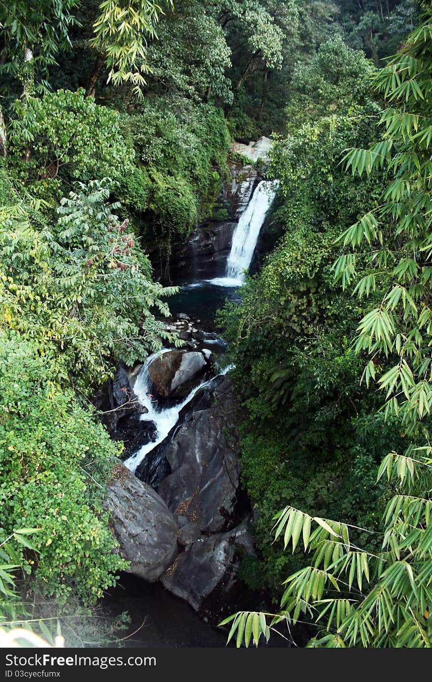 A small waterfall on himalaya alonga the annapurna trekking in nepal. A small waterfall on himalaya alonga the annapurna trekking in nepal