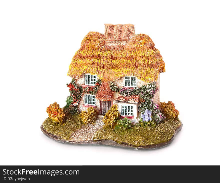 Toy country house on white background. Isolated.