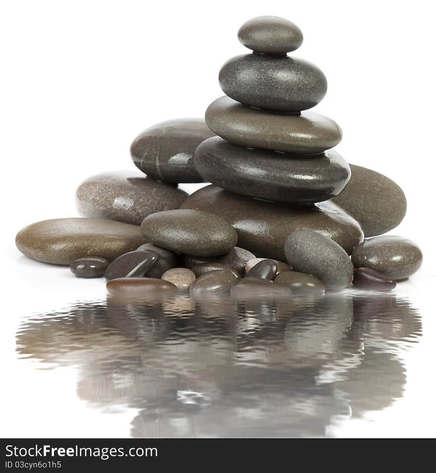 SPA. Beautiful stones for a massage on a white background