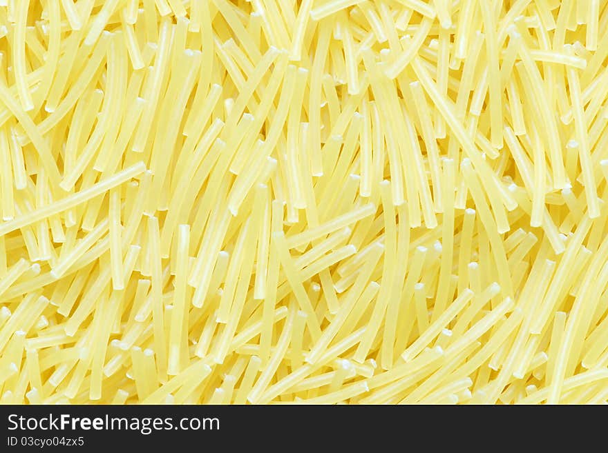 Close up view on uncooked noodle. Bacground