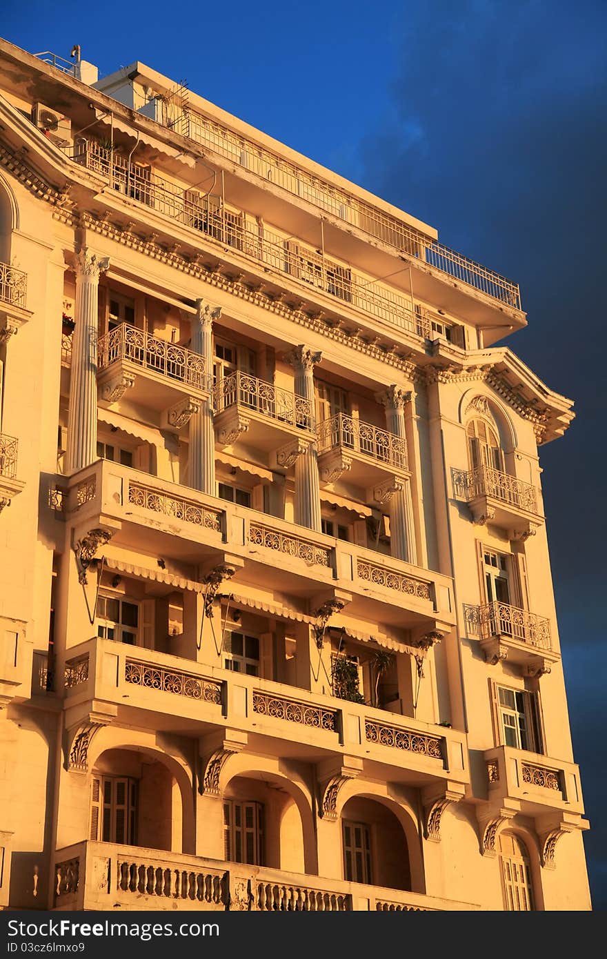 Traditional neo-classical building in the seaside of Thessaloniki. The light is natural by the sunset.