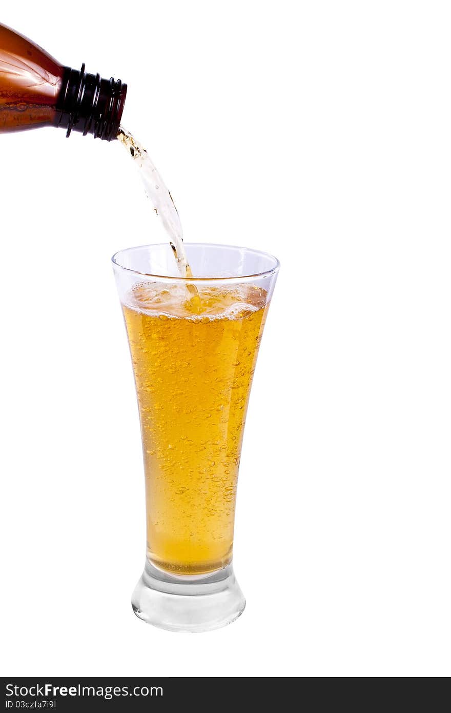 Pouring Beer into glass on white background