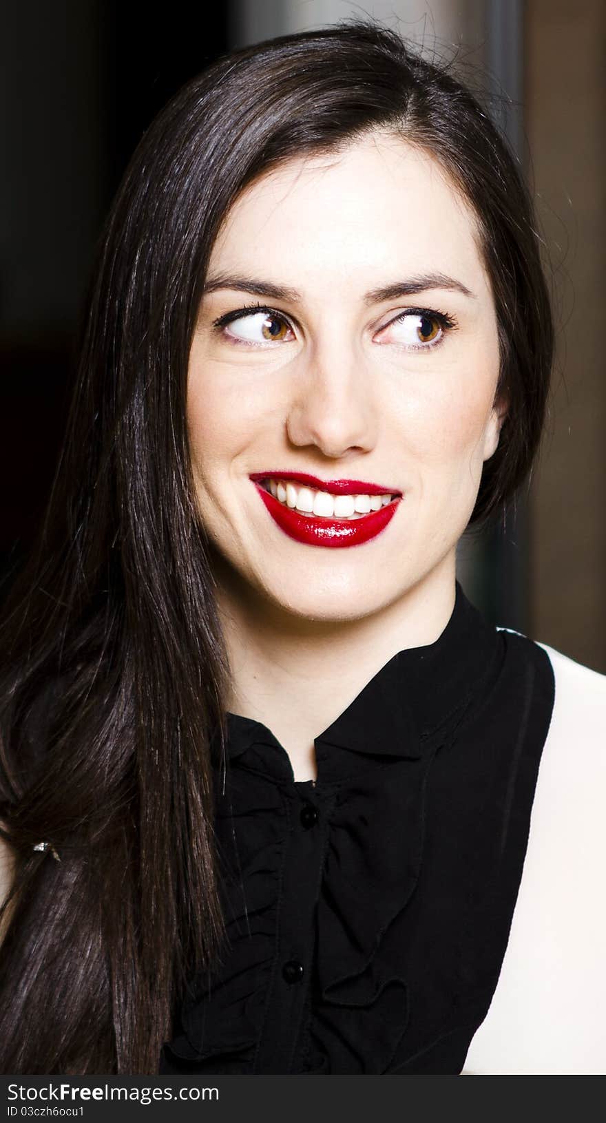 Young brunette woman portrait studio shot red lipstick. Young brunette woman portrait studio shot red lipstick