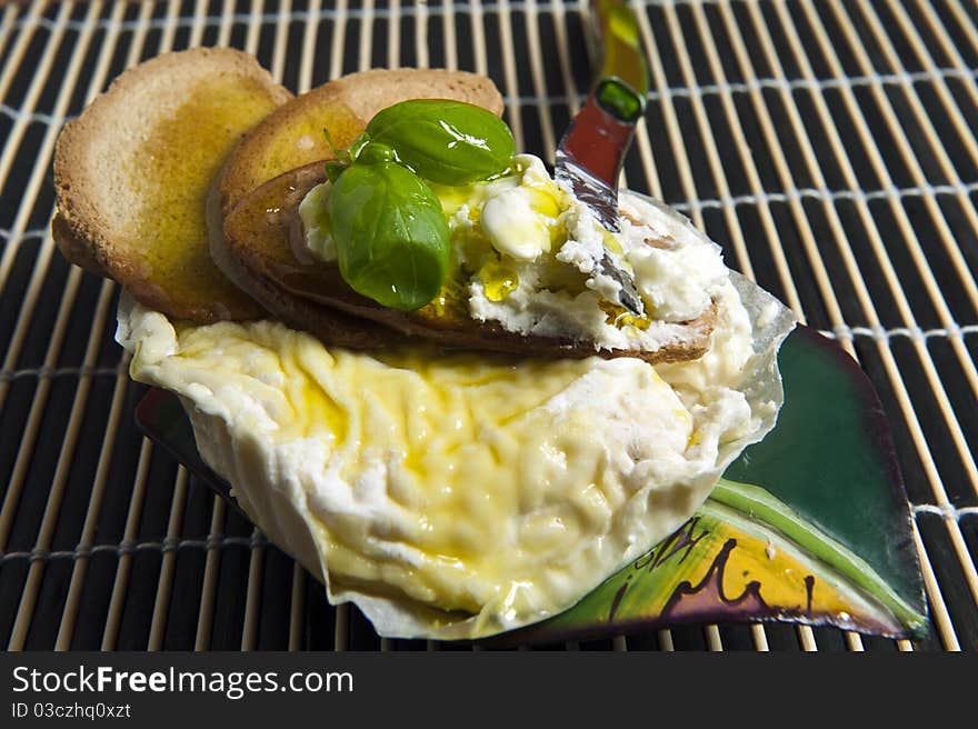 Typical Italian cheese on a wooden cutting board