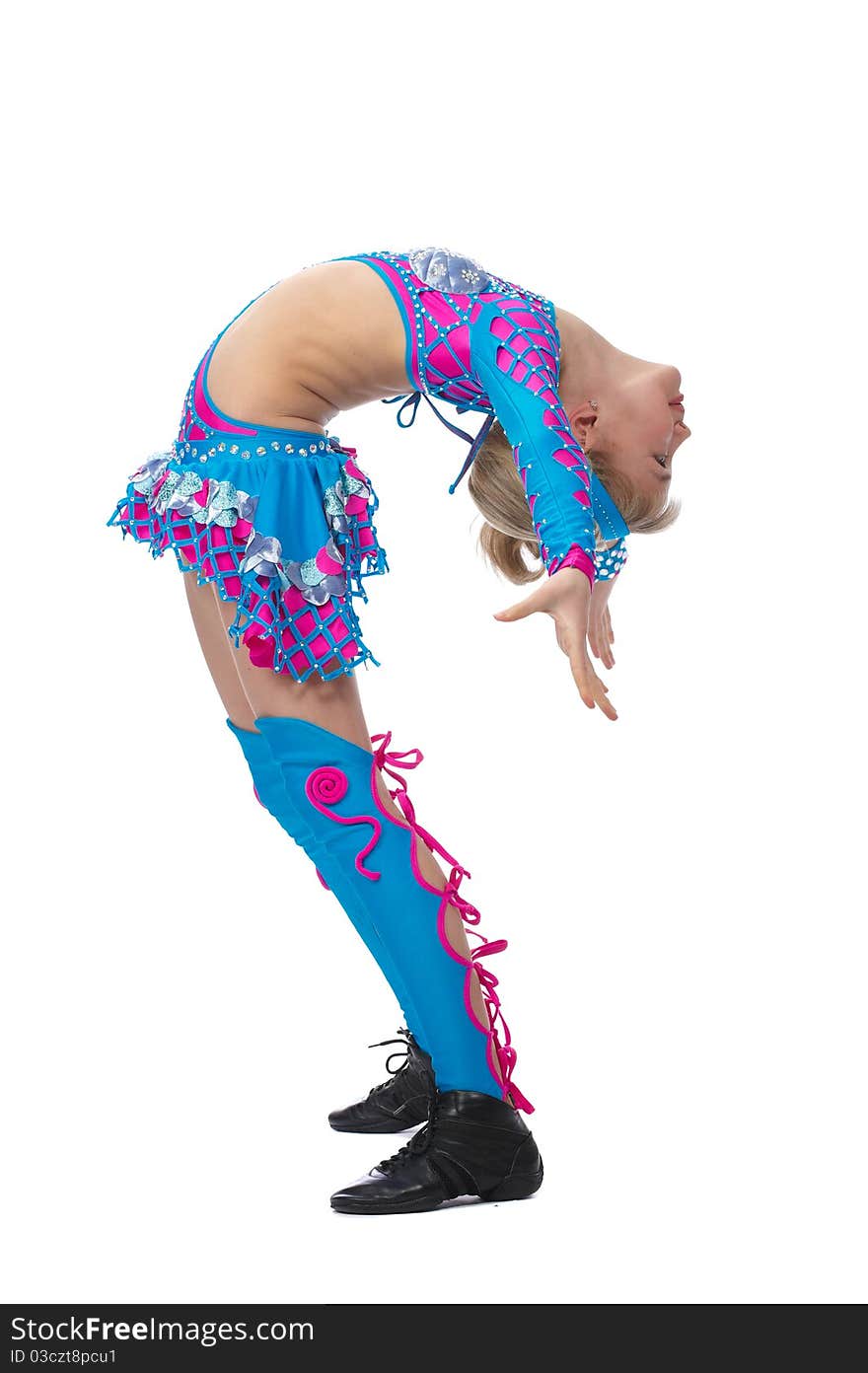 Beautiful young girl gymnast standing in nice gimnastics positionon, bent in the back a white background, isolated