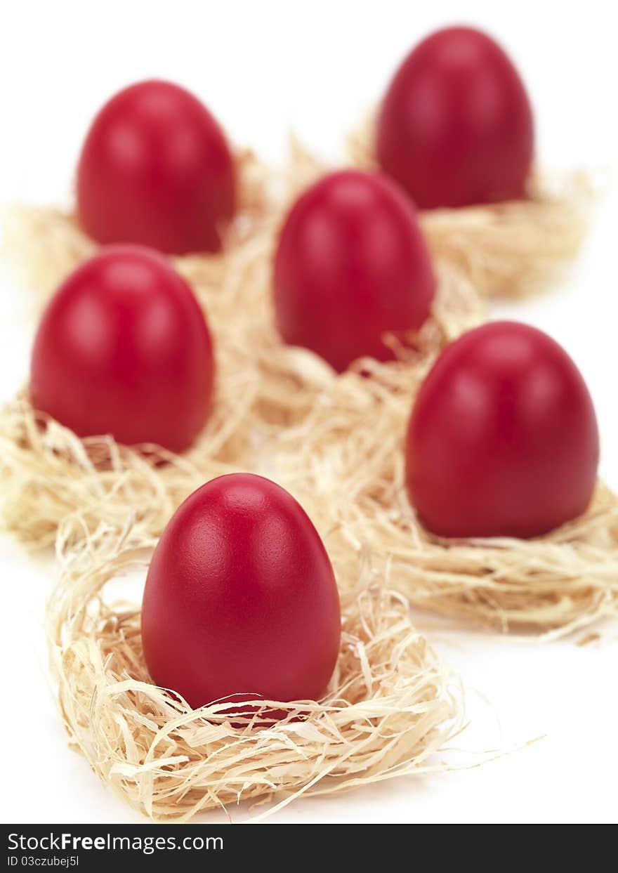 Red Eggs In Grass Nests