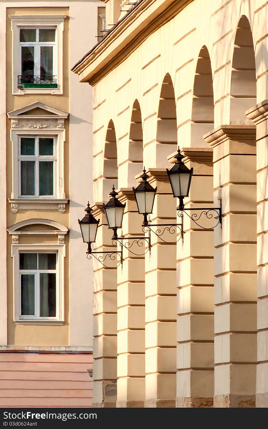 Street lamp on old house, archs and windows. Street lamp on old house, archs and windows