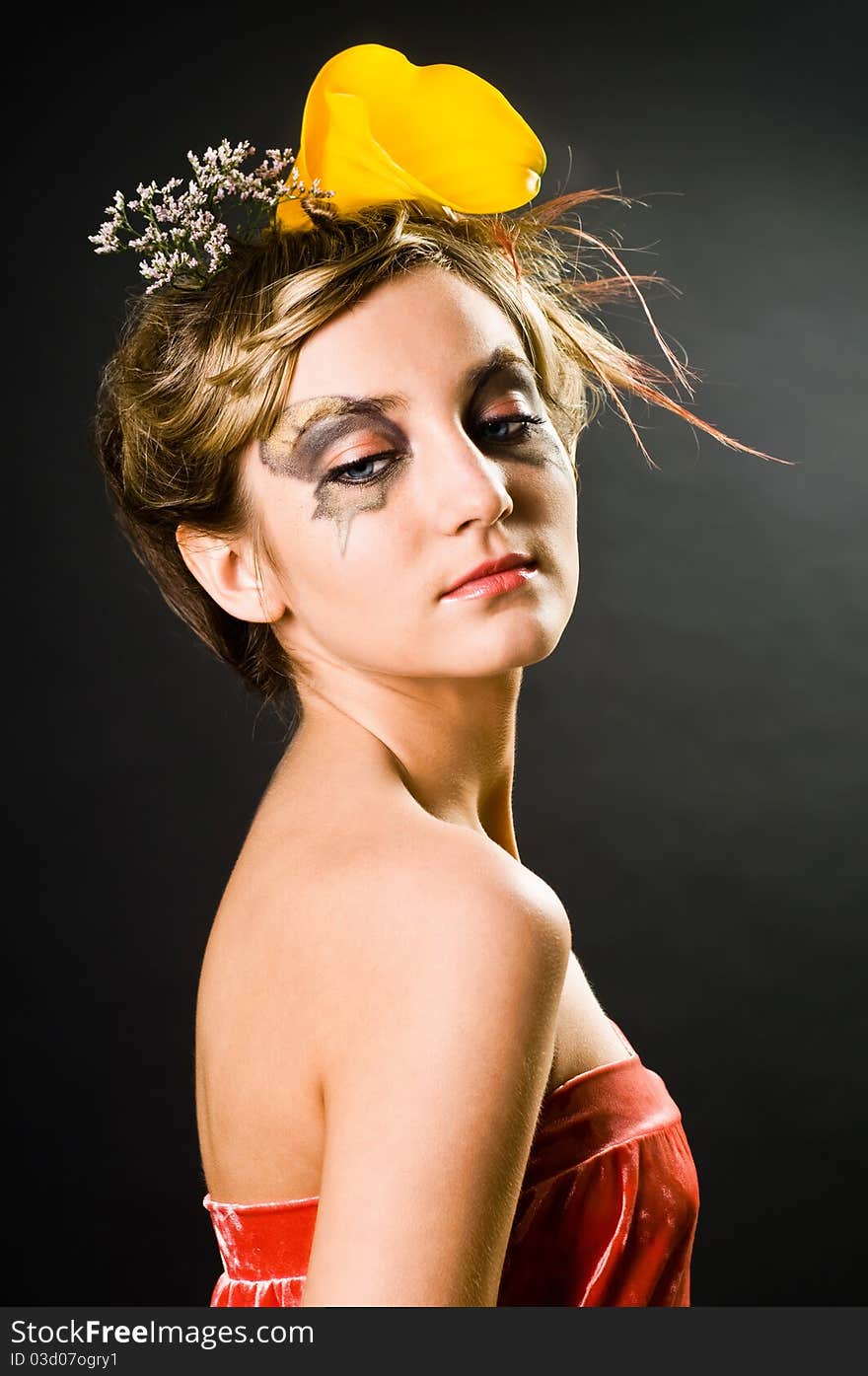 Girl with a creative hair style and makeup