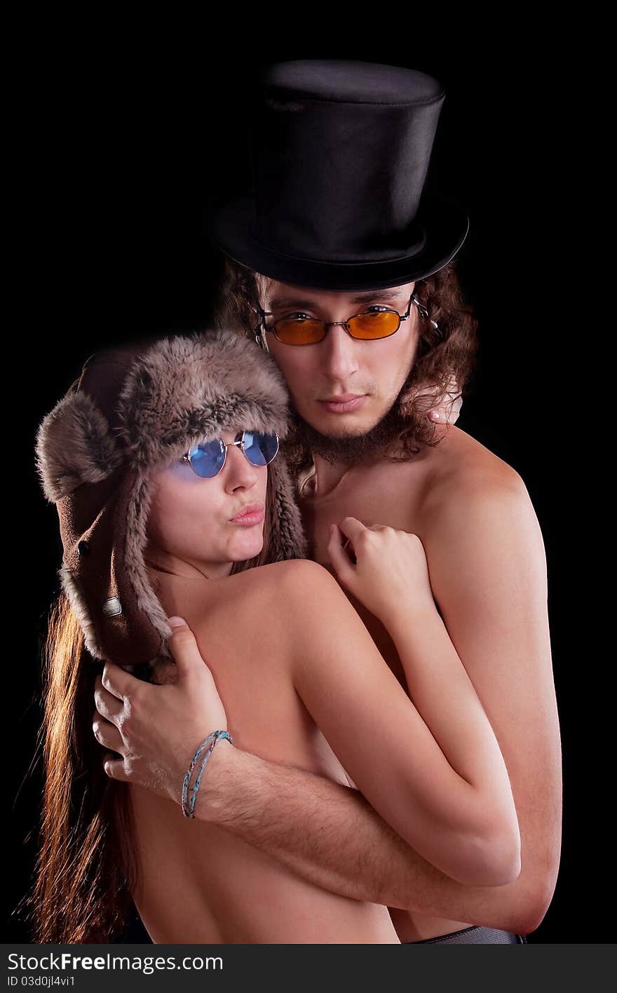 young couple. Posing in a studio. young couple. Posing in a studio