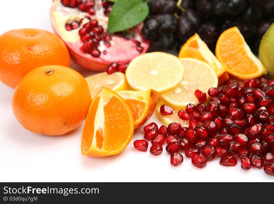 Ripe fruit on a white background