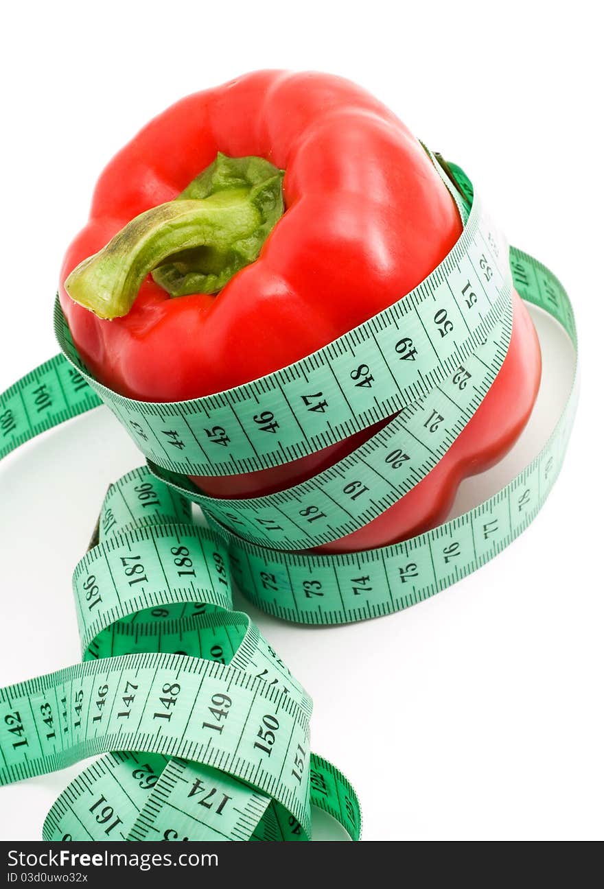 Bulgarian pepper and centimeter, white background, isolated