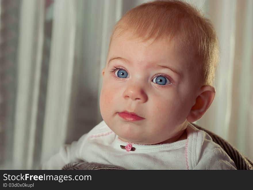 Closeup portrait of cute baby girl