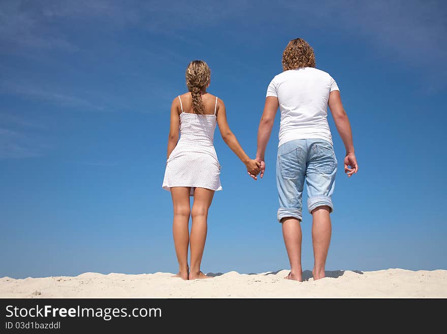 Young attractive couple at the beach