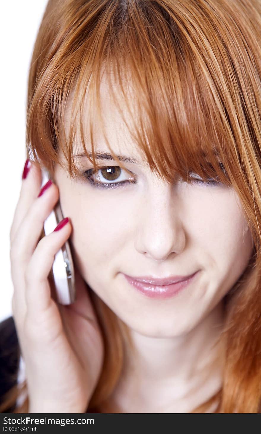 Business women calling by phone. Studio shot.