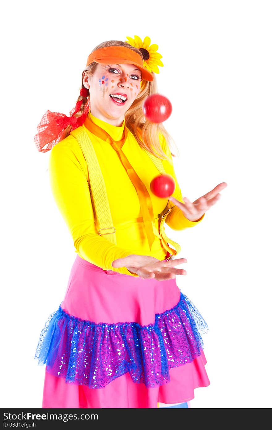 A Girl Dressed As Pippi Longstocking Juggling