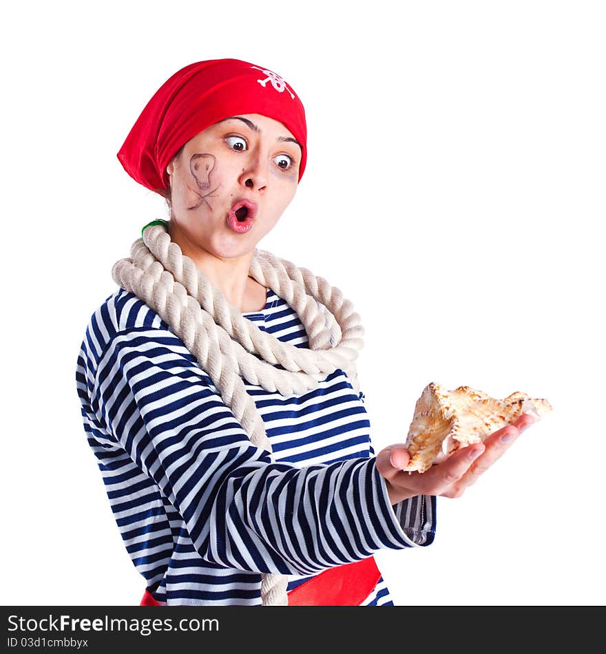 A girl dressed as a pirate with a seashell