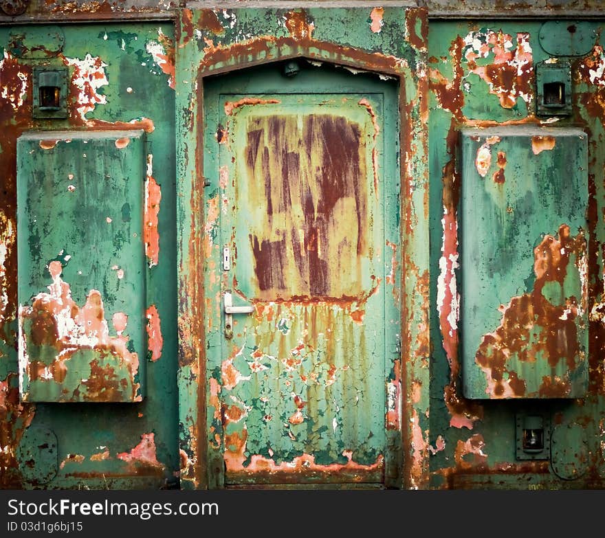 Old rusty metallic construction doorway. Old rusty metallic construction doorway