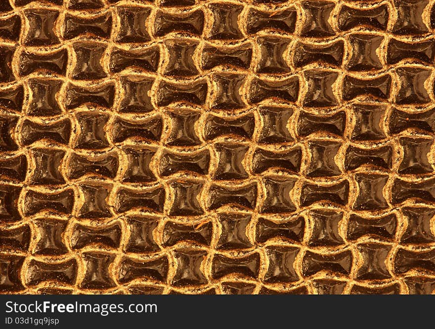 Yellow metal background close up