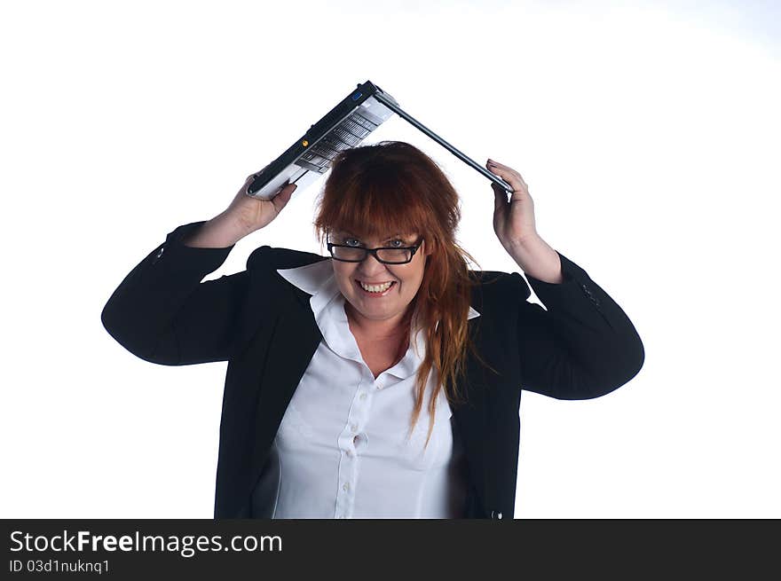 The businesswoman works at the computer at office