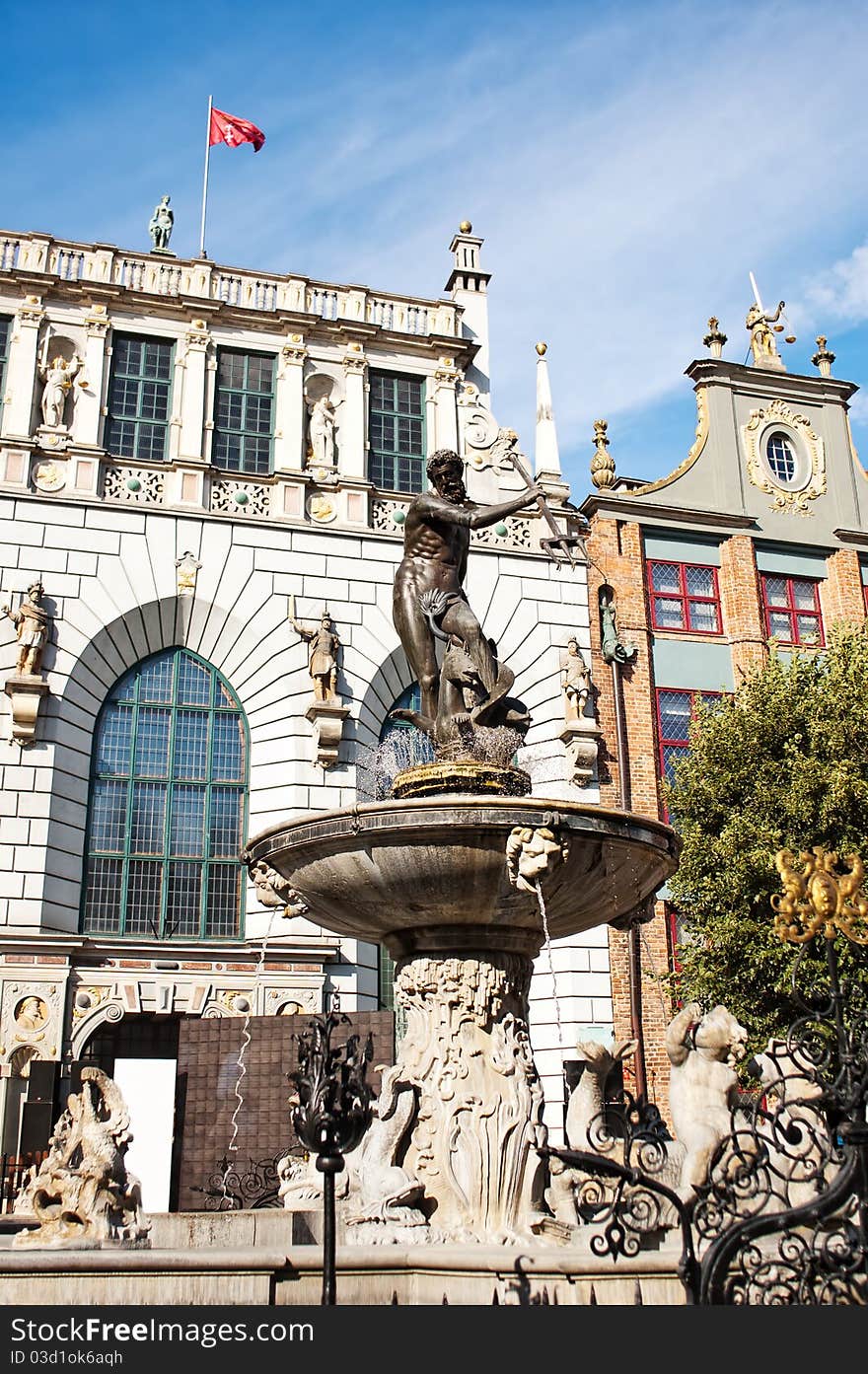 Neptune's Fountain in the center of the Long Market in Gdansk, Poland. Neptune's Fountain in the center of the Long Market in Gdansk, Poland