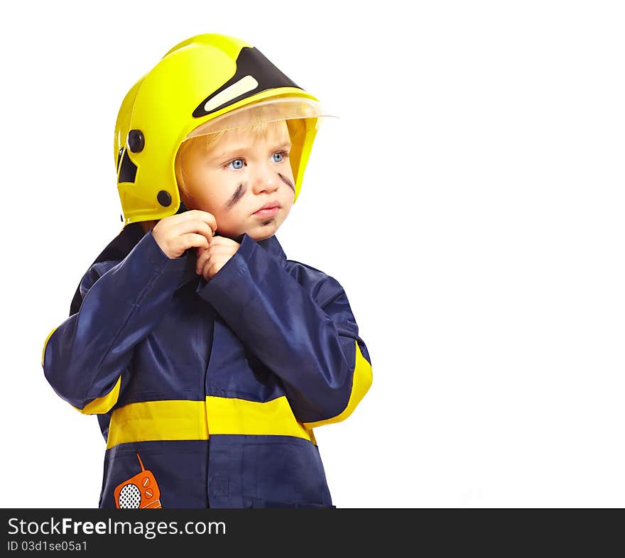 Little boy in fireman costume dress of his helmet on white background. Little boy in fireman costume dress of his helmet on white background