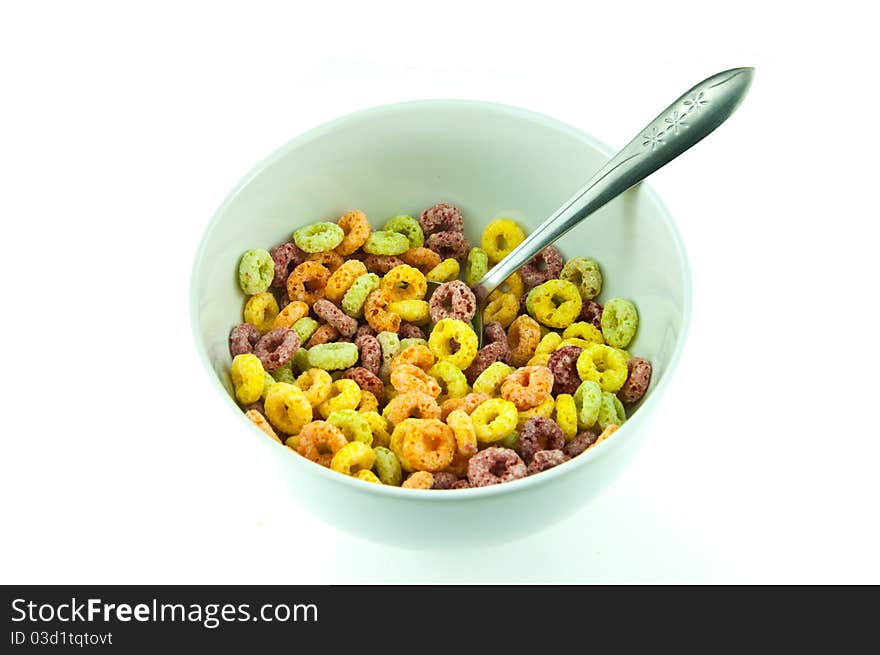 Bowl and spoon with corn flakes