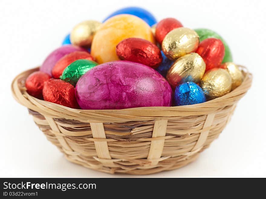 Easter nest with eggs an chocolate