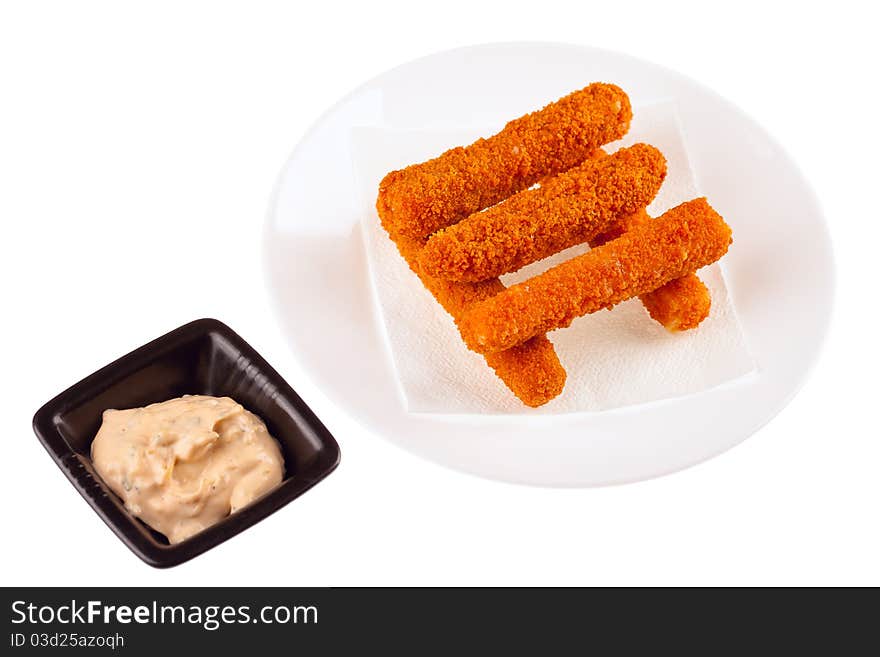 Delicious mozzarella fried sticks with cheese sauce isolated