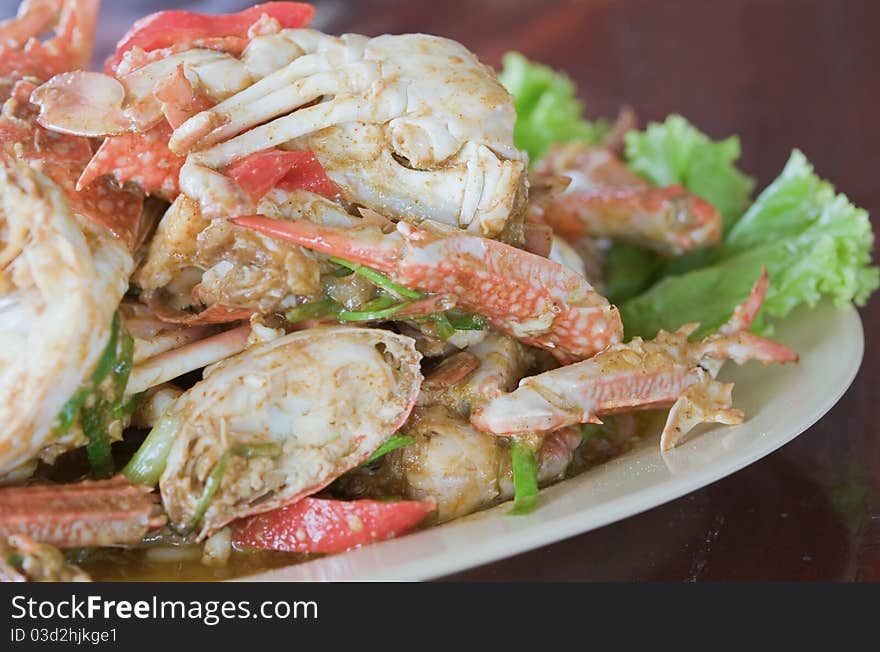 Ster fried crab meat with curry powder.