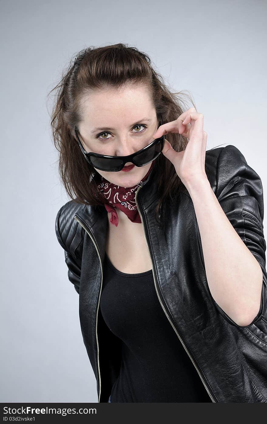 Girl posing with sunglasses