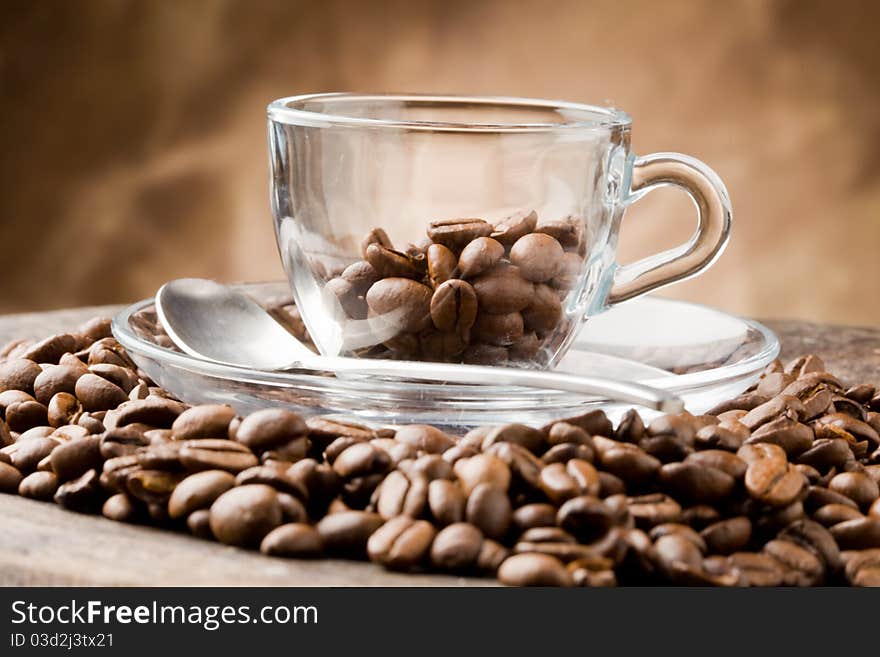 Empty Glass Cup On Coffee Beans