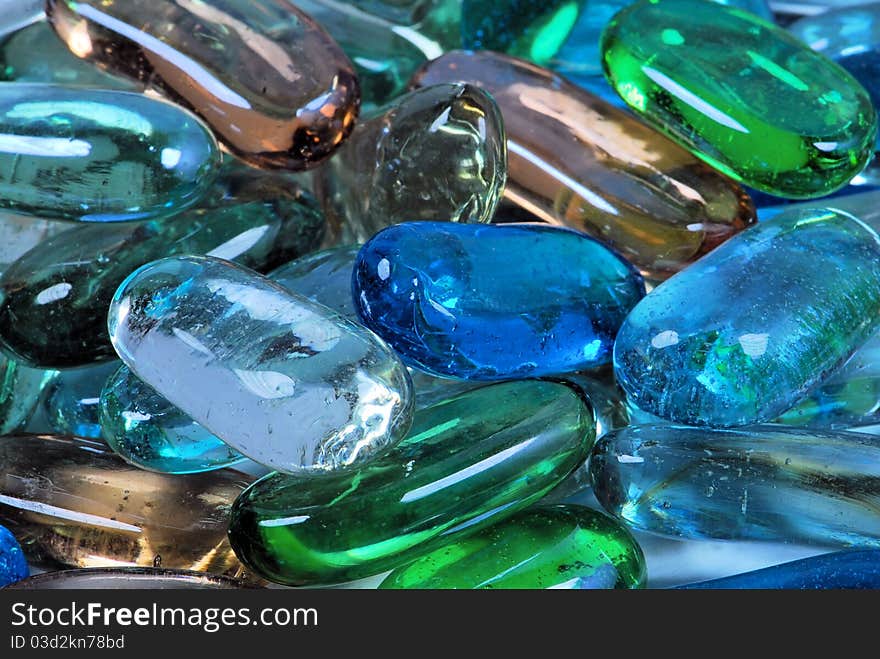 Closeup of clear glass decorative nuggets. Closeup of clear glass decorative nuggets