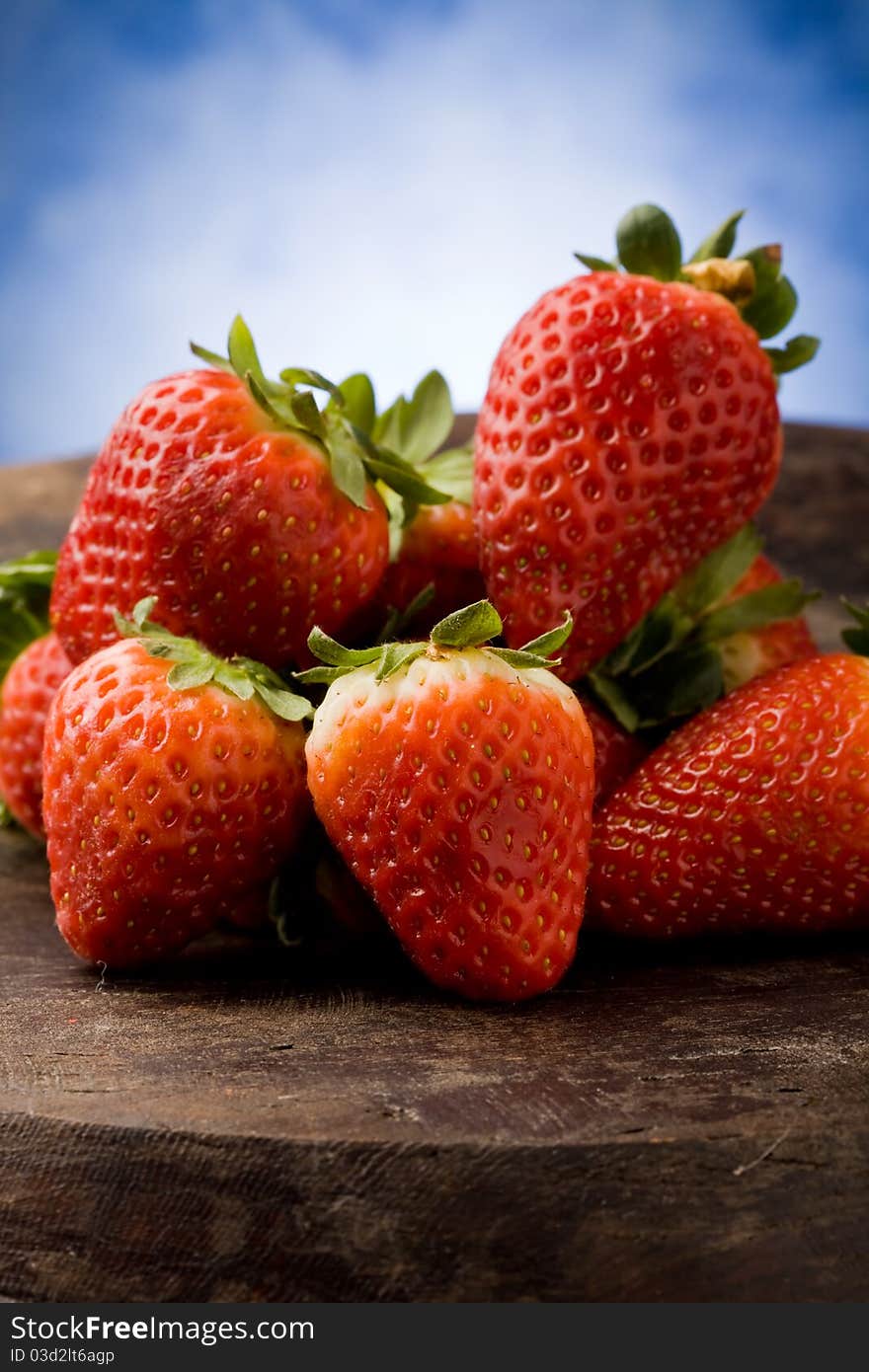 Strawberries on wooden table