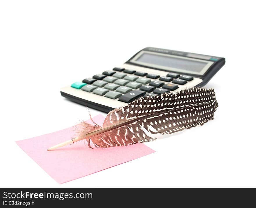 It notes and a calculator on a white background