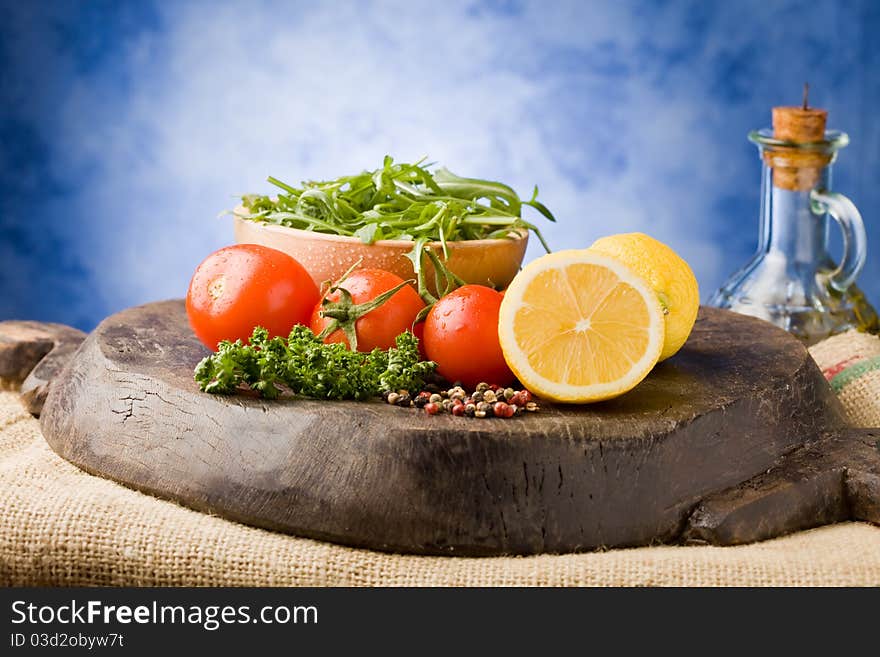 Photo of different vegetables on wooden chopping board ready for cooking