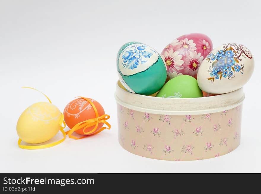 Colour eggs have dropped out of a casket