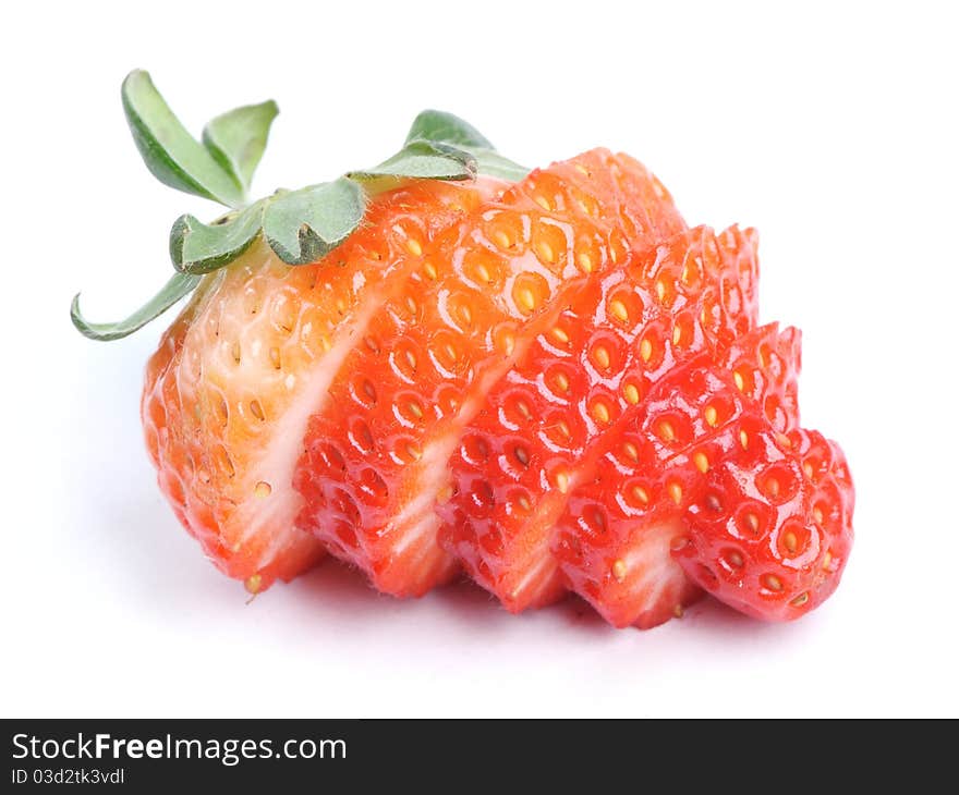 Cut strawberry isolated on white