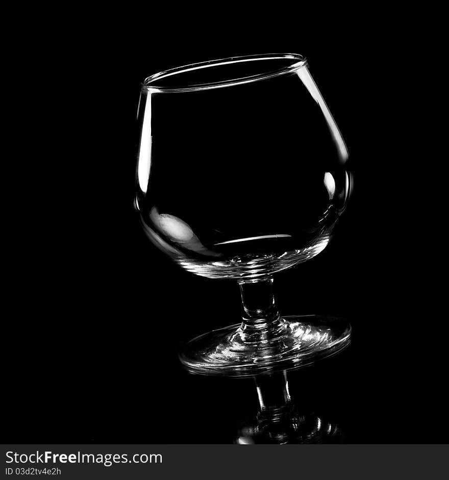 Empty glass in the dark