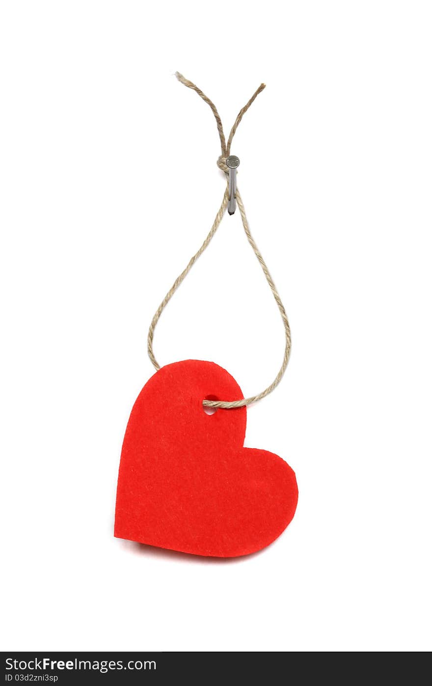 Red paper heart hanging on white background with rope and nail. Red paper heart hanging on white background with rope and nail