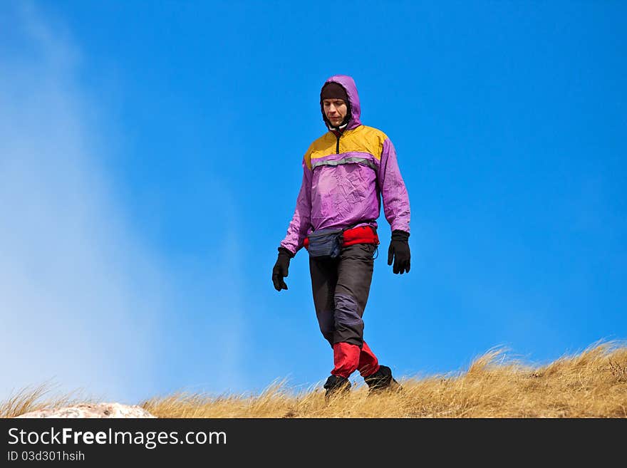 Sport hiking in mountains, walking and backpacking