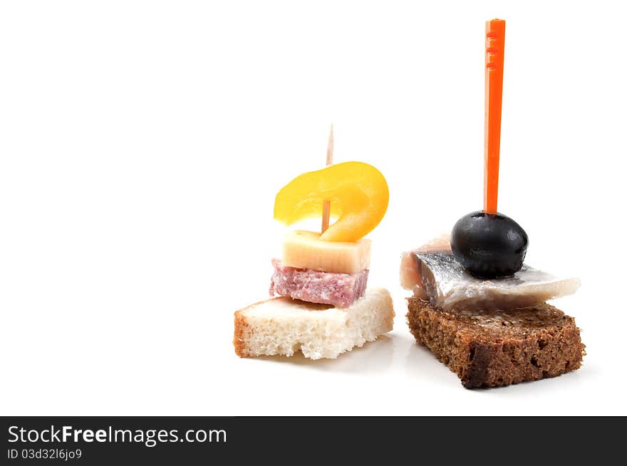 Bread with olive and salami isolated on a white background